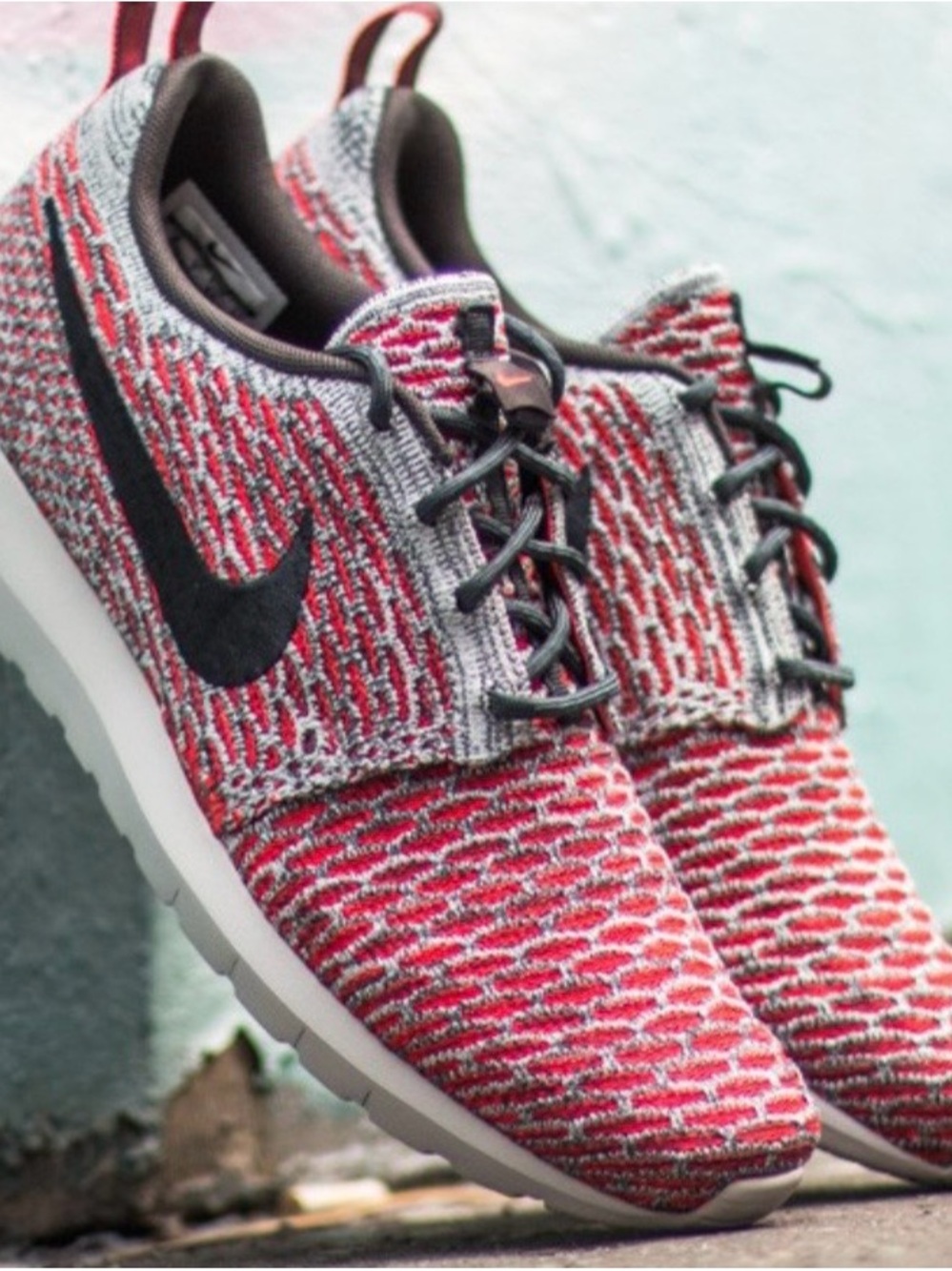 Nike Flyknit Roshe Run in the "Bright Crimson" Size 9.5